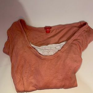 Guess body suit fits me I’m 5’1 would be more suitable for someone a bit taller